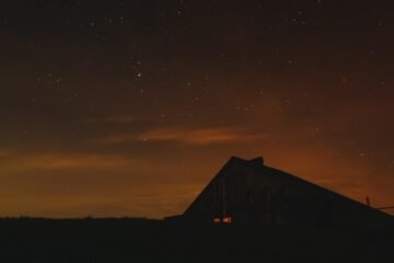 Illustrative night sky for Jay Stratton UAP interview; not a photograph of a UFO