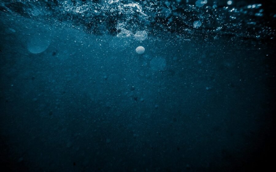 Deep blue underwater scene illustrating the Bloop ocean sound mystery