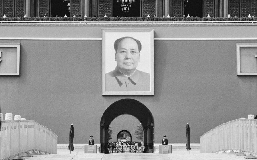Contemporary photograph of Mao Zedong's large portrait displayed on Tiananmen Gate in Beijing, representing his continuing historical symbolism; not a photo from the linked video