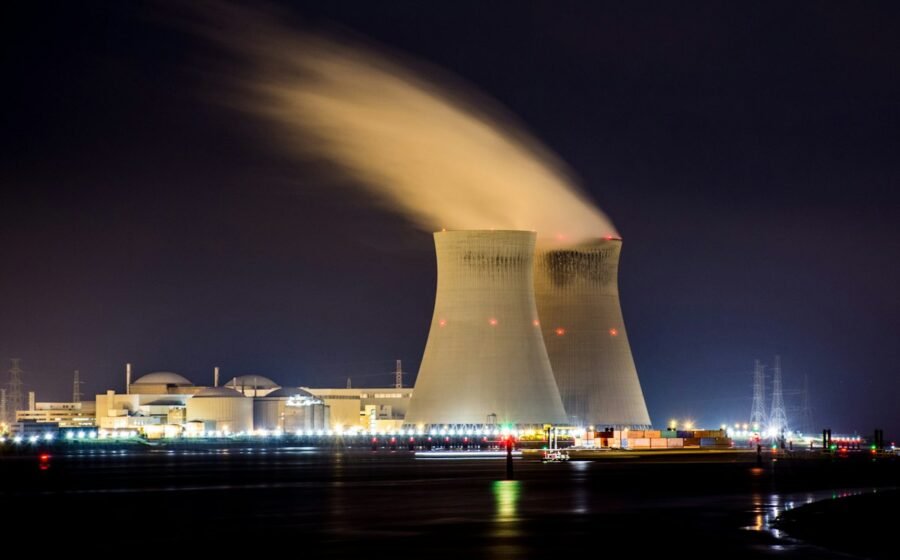 Industrial energy facility at night, illustrative image; not a photograph of a reported drone sighting